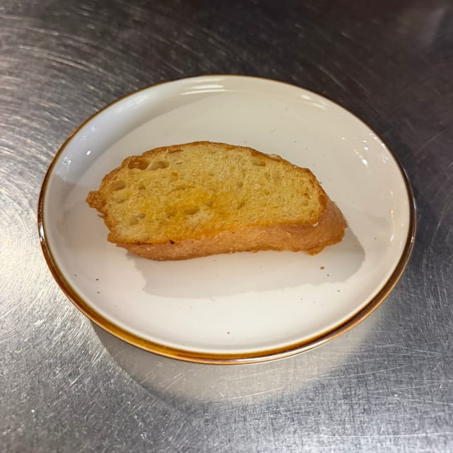 Slice Garlic Bread.