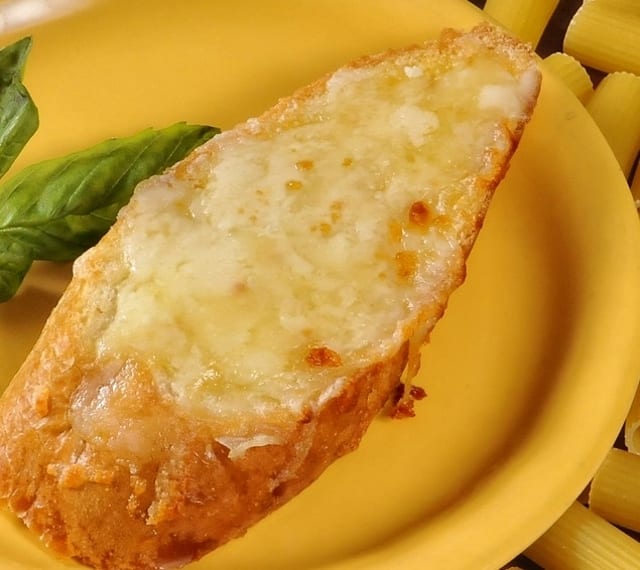 Slice Garlic Bread with Cheese.
